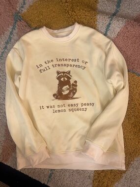 Women’s Cream Graphic Pullover Sweatshirt - Raccoon Print